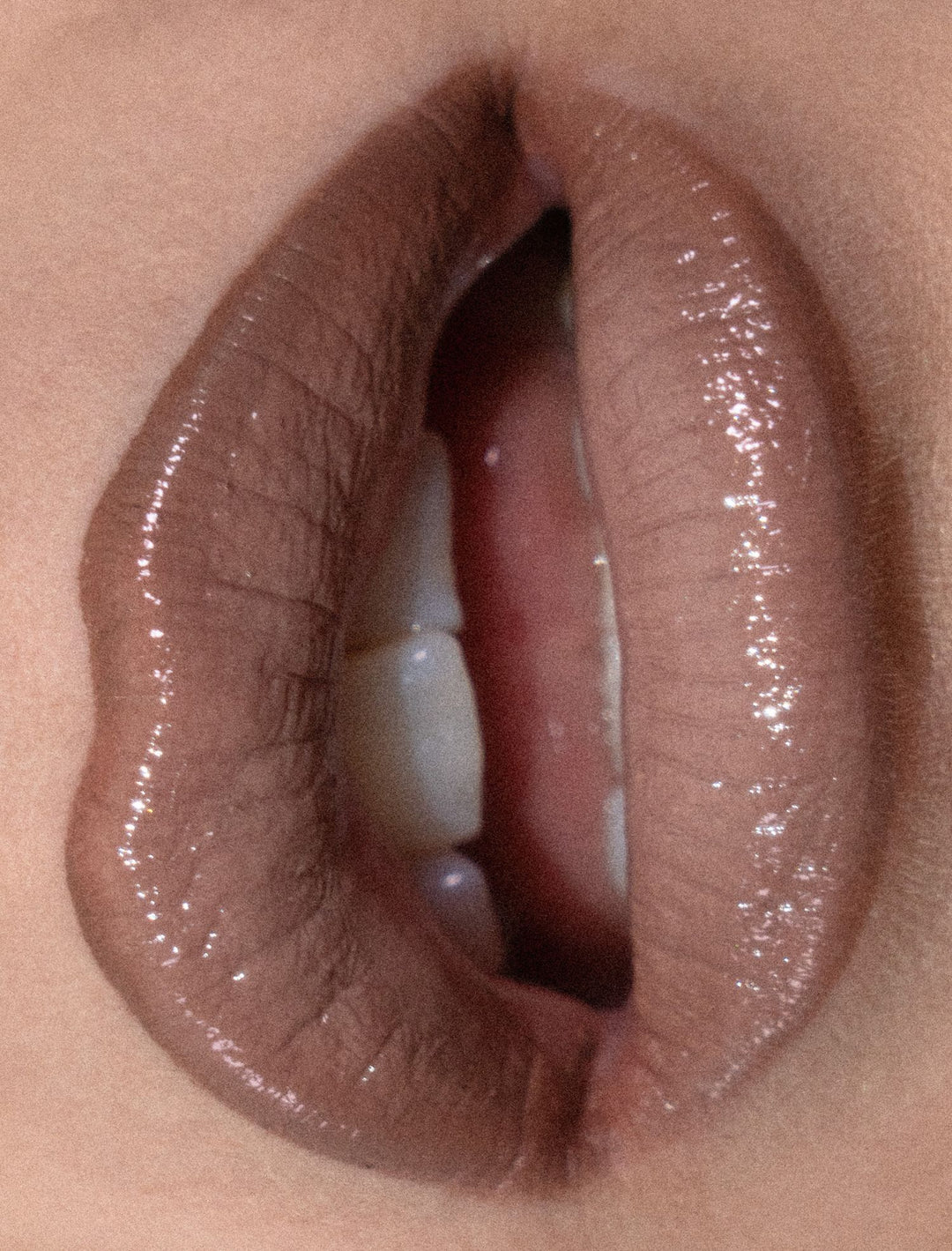DIY greige gloss kit applied on lips