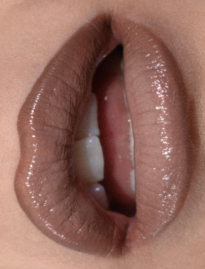 DIY greige gloss kit applied on lips